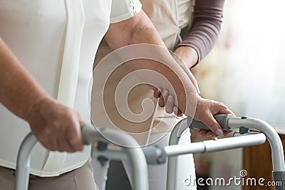 Using walker during physiotherapy Stock Photo