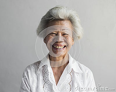 Elderly asian woman smiling face expression portrait Stock Photo