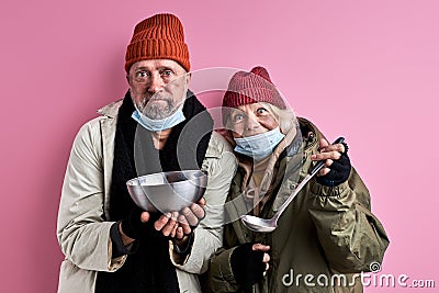 elderly beggars man and woman ask food donation Stock Photo