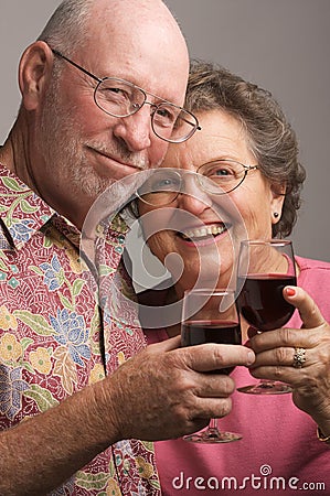 Elderly Couple Toasting Stock Photo