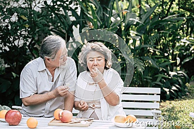 Elderly couples Cooking Healthy food Stock Photo