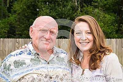 Elderly Father and Adult Daughter Stock Photo