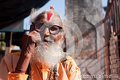 Elderly holy man with vintage glasses Editorial Stock Photo