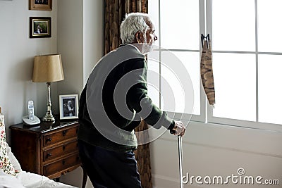 An elderly Indian man at the retirement house Stock Photo