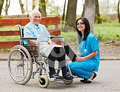 Elderly Lady in Wheelchair Stock Photo