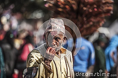 An elderly man on the streets of Kathmandu Editorial Stock Photo