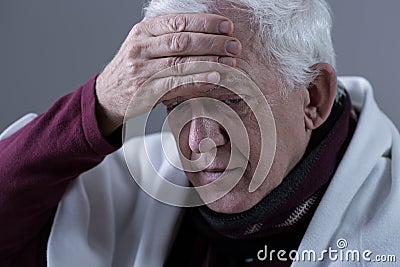 Elderly man with fever Stock Photo