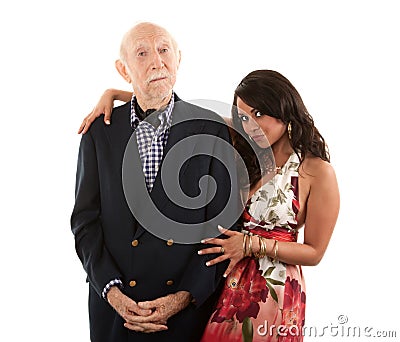 Elderly man with gold-digger companion or wife Stock Photo