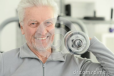 Elderly man in a gym Stock Photo