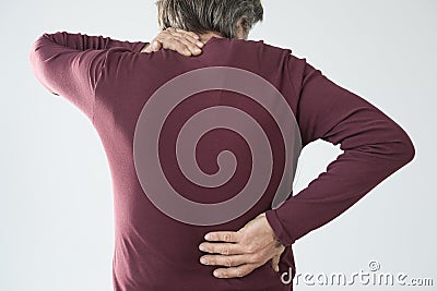 Elderly man has back and neck pain Stock Photo