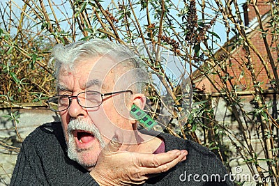 Elderly man loosing his memory. Stock Photo