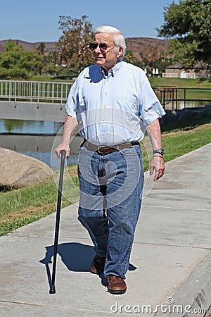 Elderly Man Walks With A Cane Royalty Free Stock Image - Image: 10951806