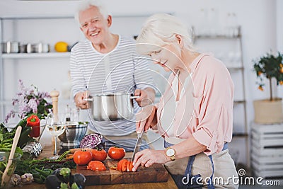 Elderly marriage on culinary workshop Stock Photo