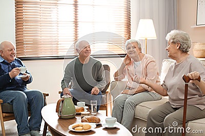 Elderly people spending time in hospice. Senior patients care Stock Photo