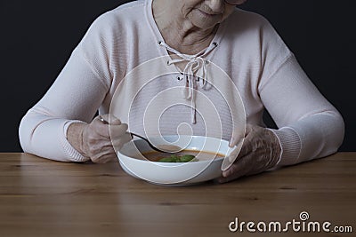 Elderly person with appetite disorders Stock Photo