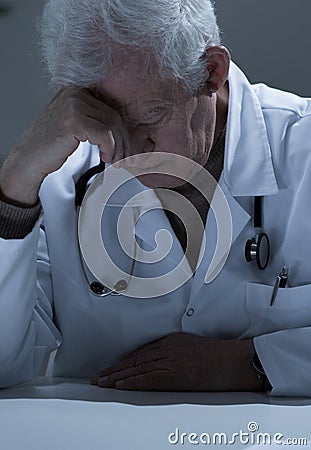 Elderly practitioner having sinus pain Stock Photo