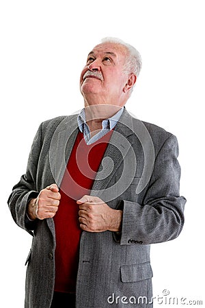 Elderly retired man standing looking up Stock Photo