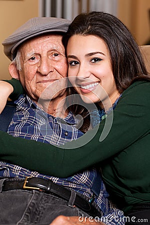 Elderly Senior Grandfather and Teen Granddaughter Stock Photo