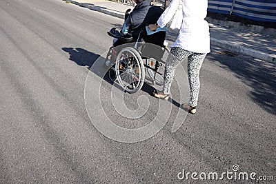 Elderly on wheelchair Stock Photo