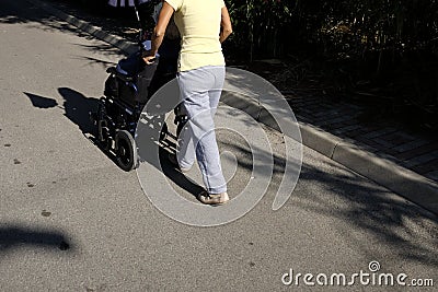 Elderly on wheelchair Stock Photo