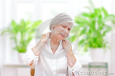 Senior woman acute shoulder pain Stock Photo