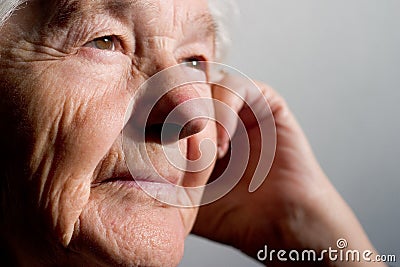 Elderly woman contemplating Stock Photo