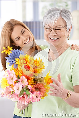 Elderly woman and daughter smiling happily Stock Photo