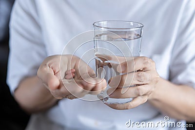 Elderly woman eat drug Medicine eating healthy medicine Stock Photo