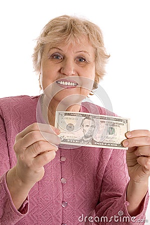 The elderly woman with a five-dollar denomination Stock Photo