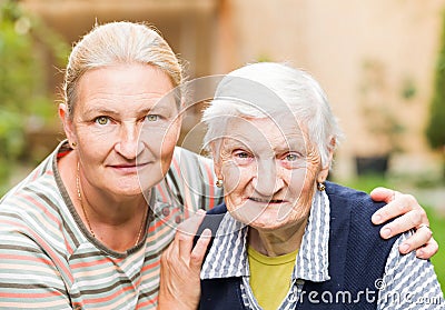 Elderly woman with her daughter Stock Photo