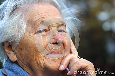 Elderly woman smiling Stock Photo