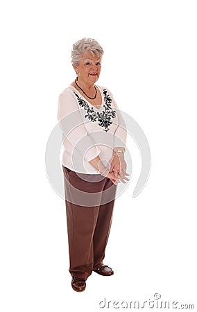 Elderly woman standing full body. Stock Photo