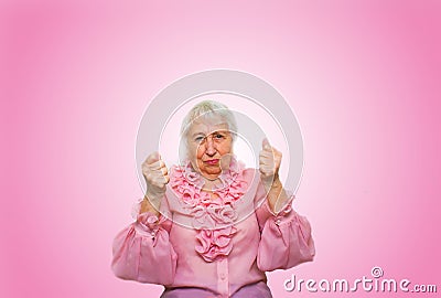 Elderly woman in suspense and determination Stock Photo