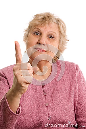 The elderly woman threatens with a finger Stock Photo