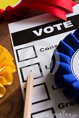 Election Ballot Paper With Rosettes Of Political Parties Stock Photo