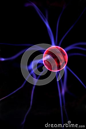 Electric ball emitting blue lightning Stock Photo