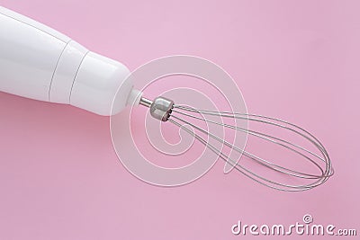 Electric blender with a whisk for mixing eggs. The mixer is used to make cream Stock Photo