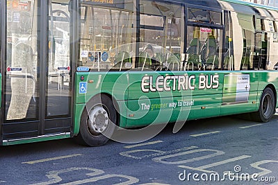 Green Electric bus with Rechargeable battery - Elecric power Editorial Stock Photo