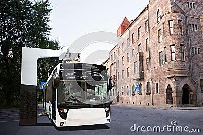 Electric bus at a stop Stock Photo