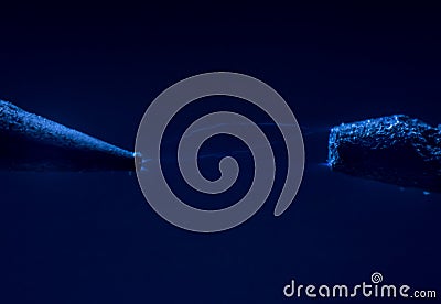 Electric cable close-up with glowing electricity lightning. Macro shot Stock Photo