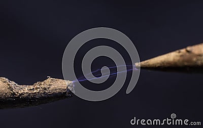 Electric cable close-up with glowing electricity lightning. Macro shot Stock Photo