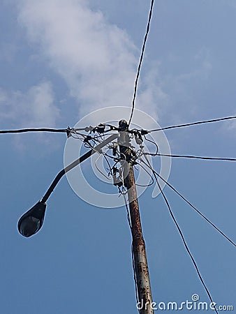 Electric cable pole taken from lower angle Stock Photo