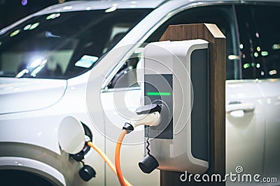 Electric car charging energy in station Stock Photo