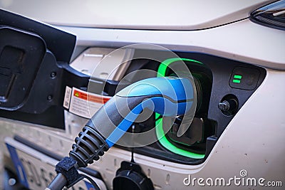 Electric car charging its battery Editorial Stock Photo