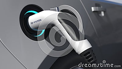 Charging electric car plug with HYUNDAI logo on it. Editorial conceptual 3d rendering Editorial Stock Photo