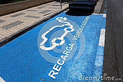 parking for automobile recharge (Electric Automobile Recharge), in city center. Stock Photo