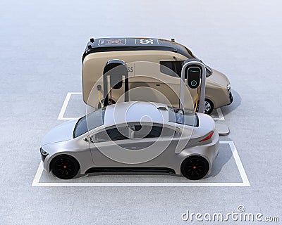 Electric delivery minivan and silver sedan charging at charging station Stock Photo