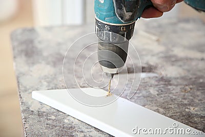 Electric drill make renovation indoor Stock Photo