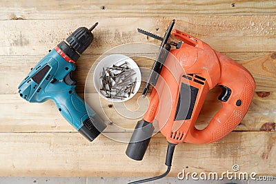 Electric drill, screws, electric jig saw Stock Photo