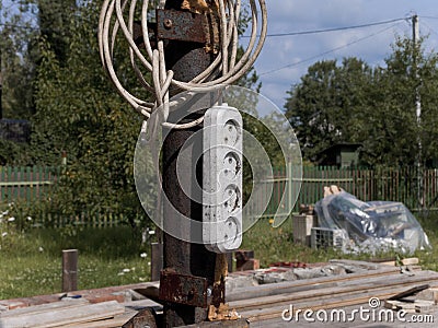 Electric extension cable outdoor Stock Photo